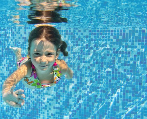 Girl underwater in a swimming pool