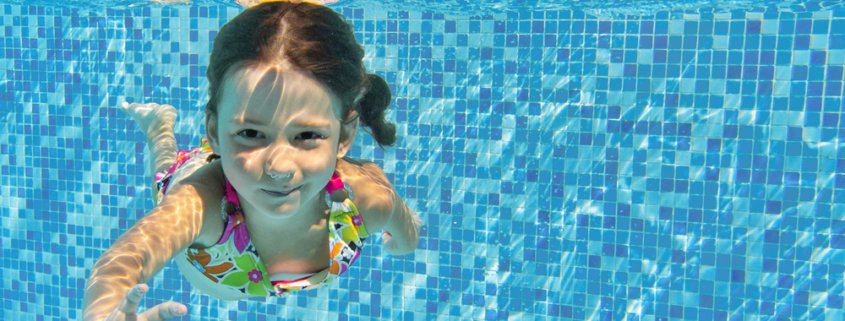 Girl underwater in a swimming pool