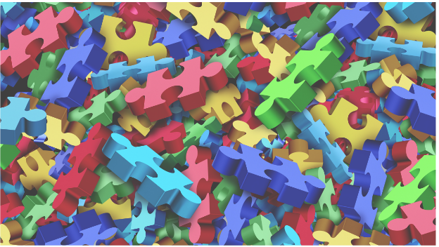 Autism awareness banner image - colorful puzzle pieces.